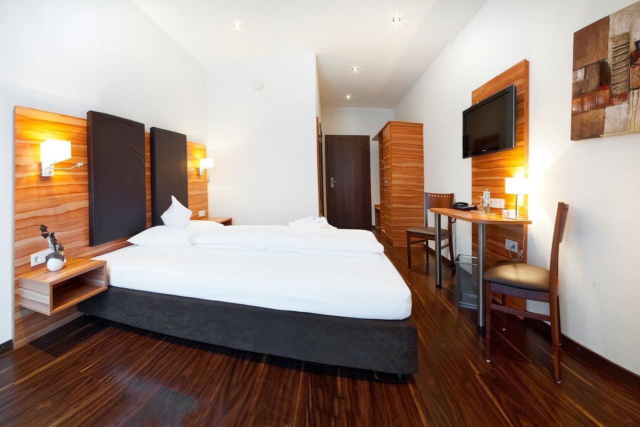 Hotel-Renner Buchbach Pokoj fotografie